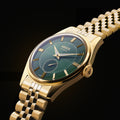 A refined olive green watch mens design with gold accents, made for effortless everyday elegance.