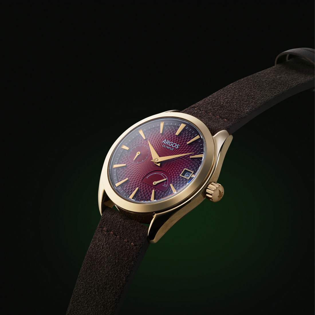 Carmine red Argos watch with a gold case and brown leather strap, a premium men’s timepiece.